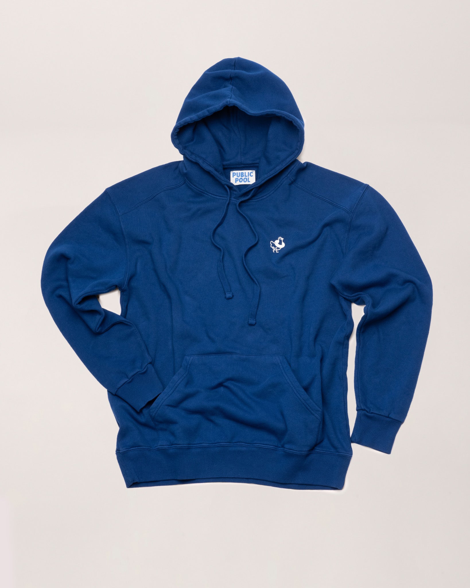 A blue hoodie with a white Public Pool icon.