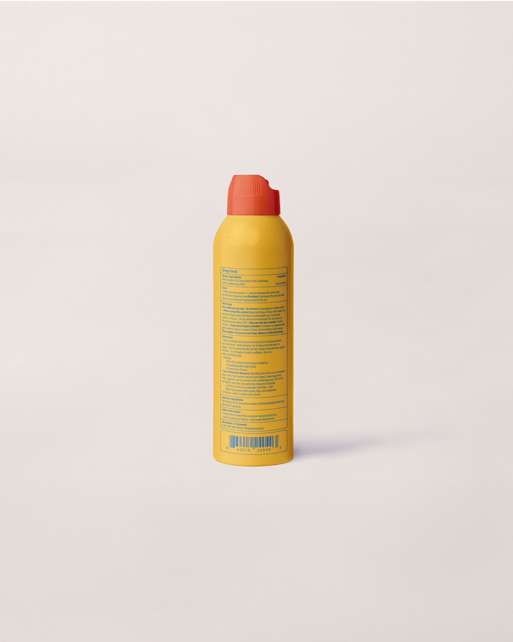 One side of a yellow sunscreen bottle.